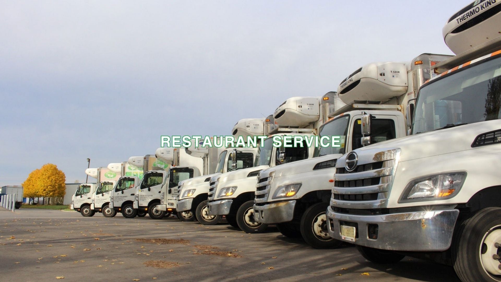This is a picture of trucks of Lucky Supply. Shows how professional Lucky supply is. There is a line of text in the middle saids "Restaurant Service" which explain our purpose of business